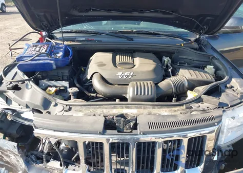 2013 Jeep Grand Cherokee Laredo z USA, uszkodzony, nr VIN 1C4RJFAG8DC633305